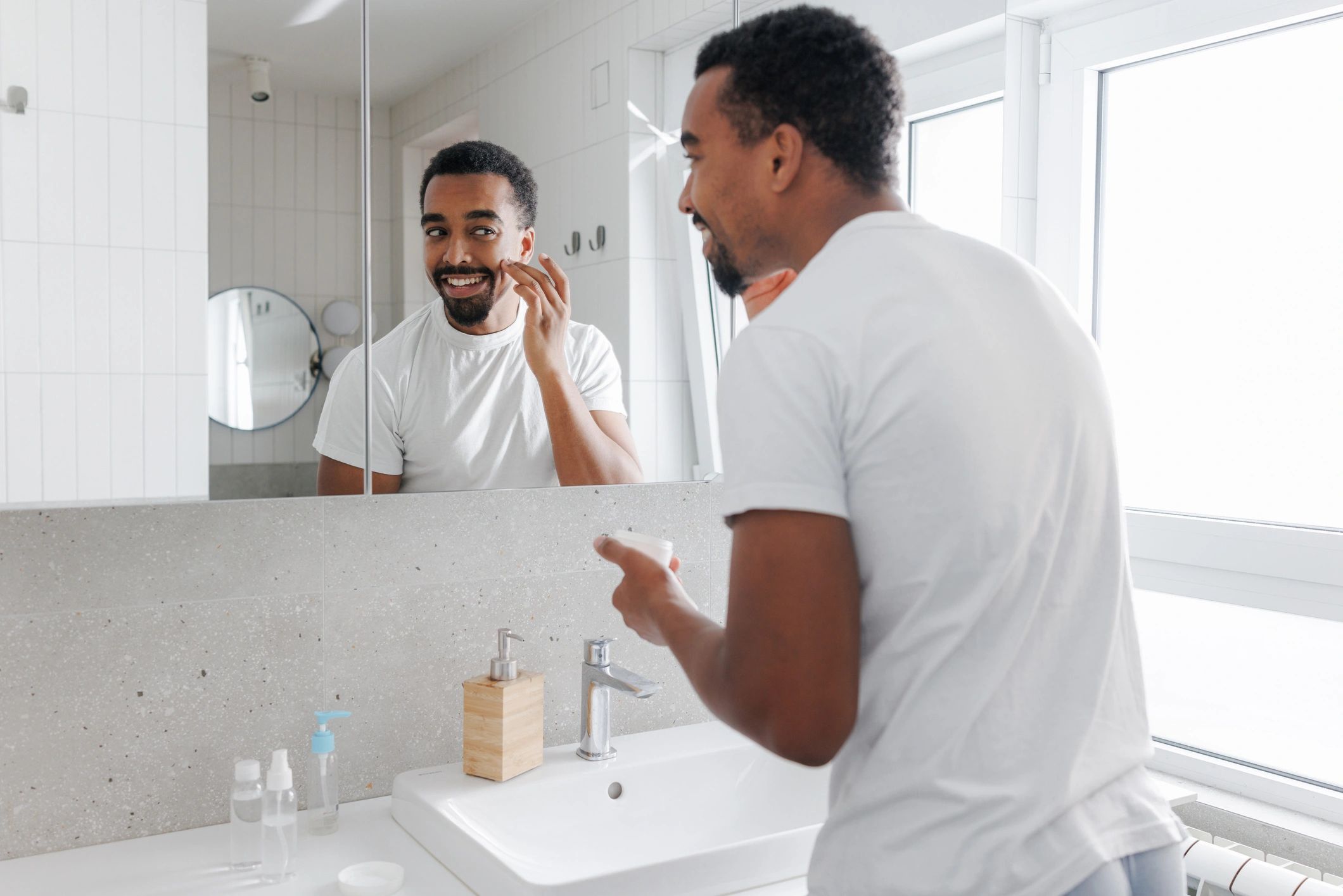 Modern men's skincare routine with clean products